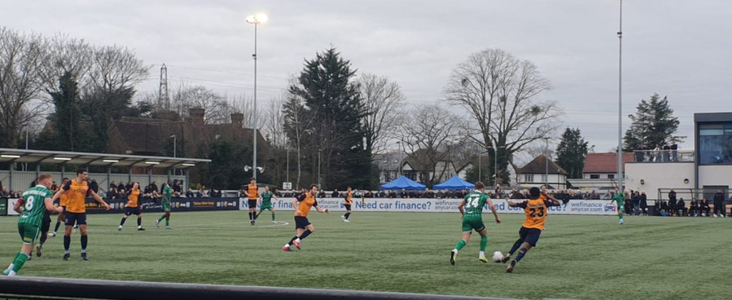 Charlie Cooper battling in midfield.