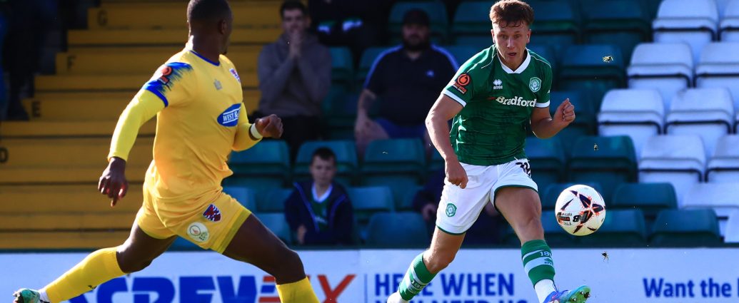 James Plant whips a ball in to the box.