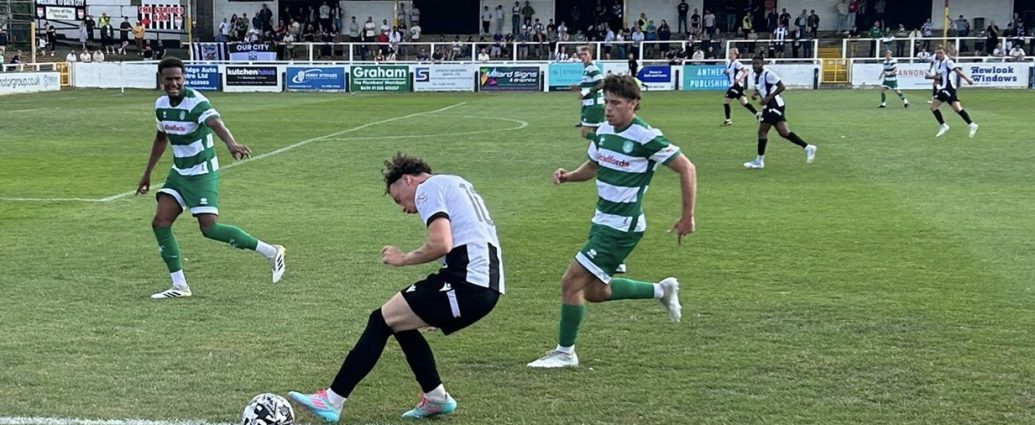 The ball runs out of play for Bath's Ewan Clark with Byron Pendleton and Morgan Williams in close attendance.