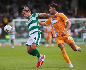 Luke McCormick tries to bring the ball under control.