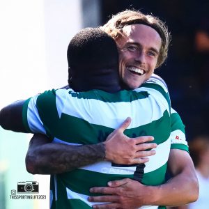 Harvey Greenslade celebrates with Junior Morias.