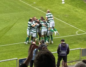 Yeovil Town's players jump on striker Harvey Greenslade after his 58th minute goal.