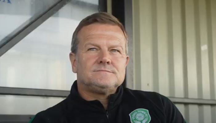 Mark Cooper speaks to the media.